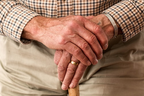 a close up of an elderly person's hands